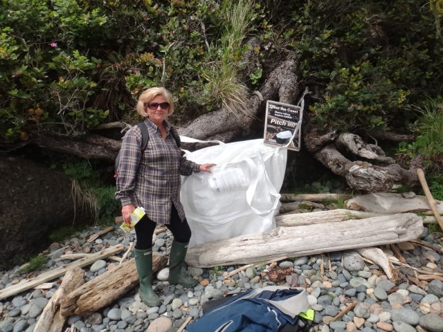 collection bags on the beach